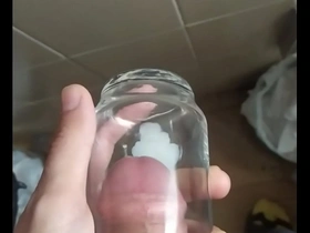 Thick white cock cum in glass