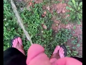 My husband pissing in the yard
