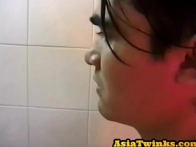 Asian twunk enjoys stroking his unshaven shaft in bathroom
