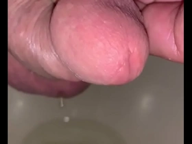Freshly shaved cock peeing